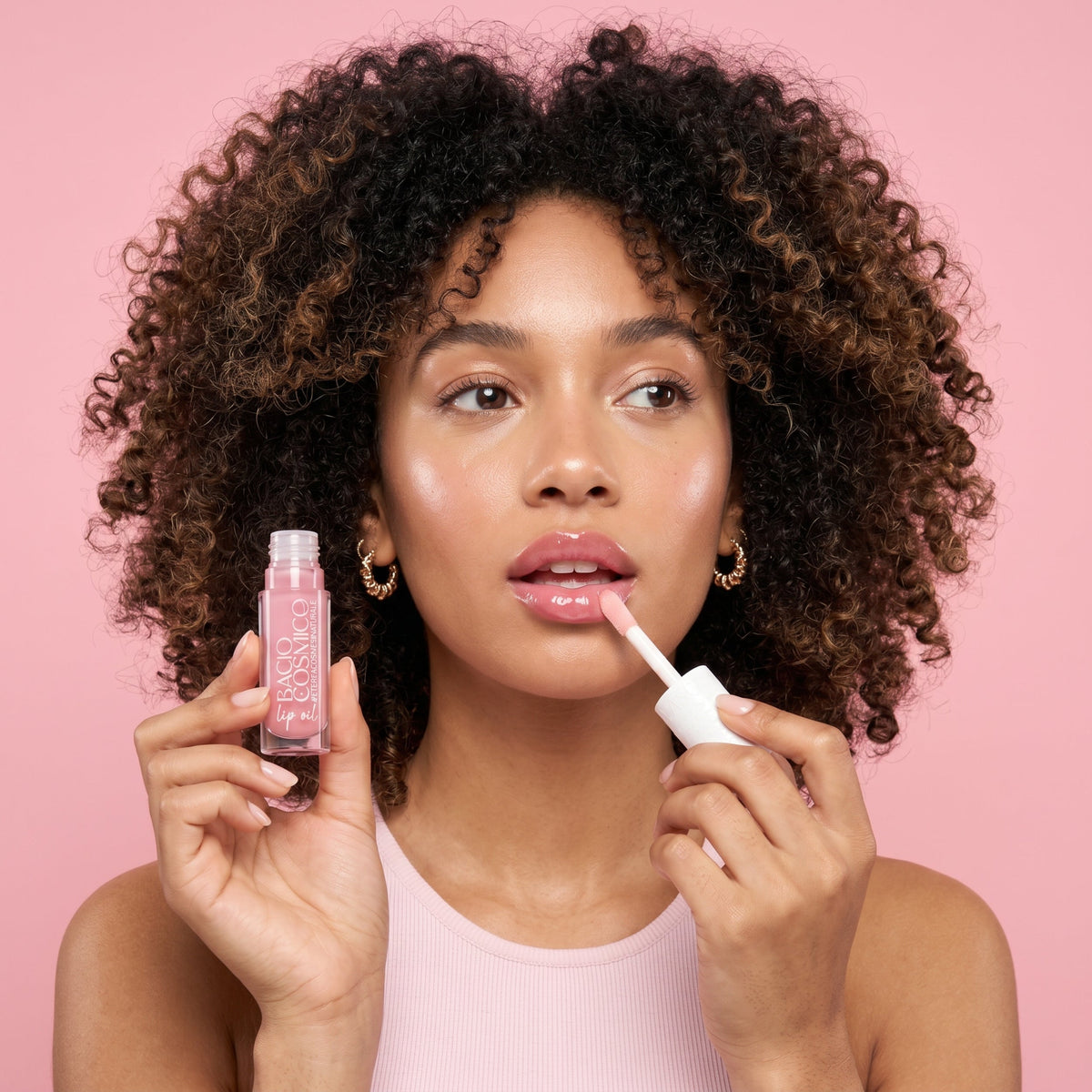 Lip oil glossy rimpolpante con acido ialuronico Bacio Cosmico Pink Moon